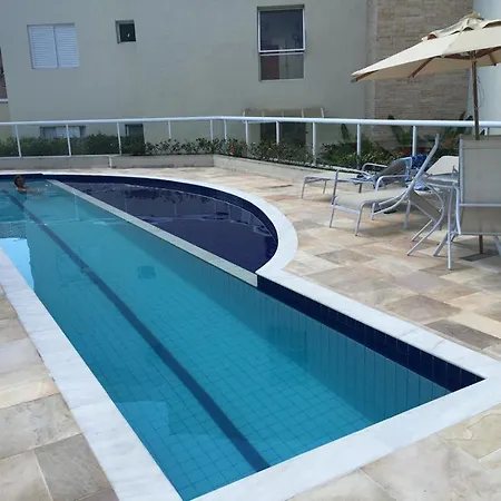 Apt térreo com quintal Praia de Enseada Lazer total-2